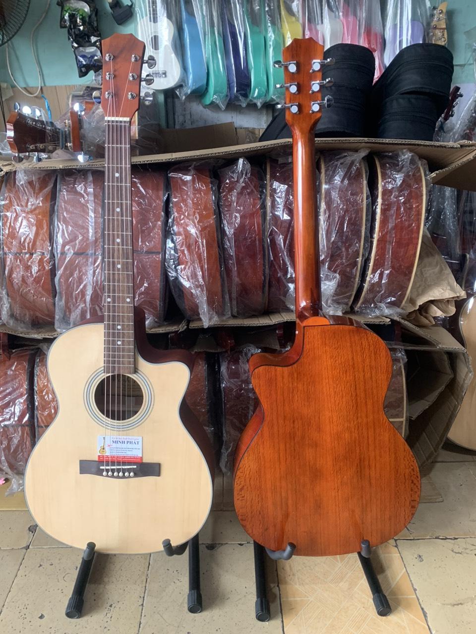 dan-guitar-acoustic-go-hong-dao-gia-re-MP-A3 (1)